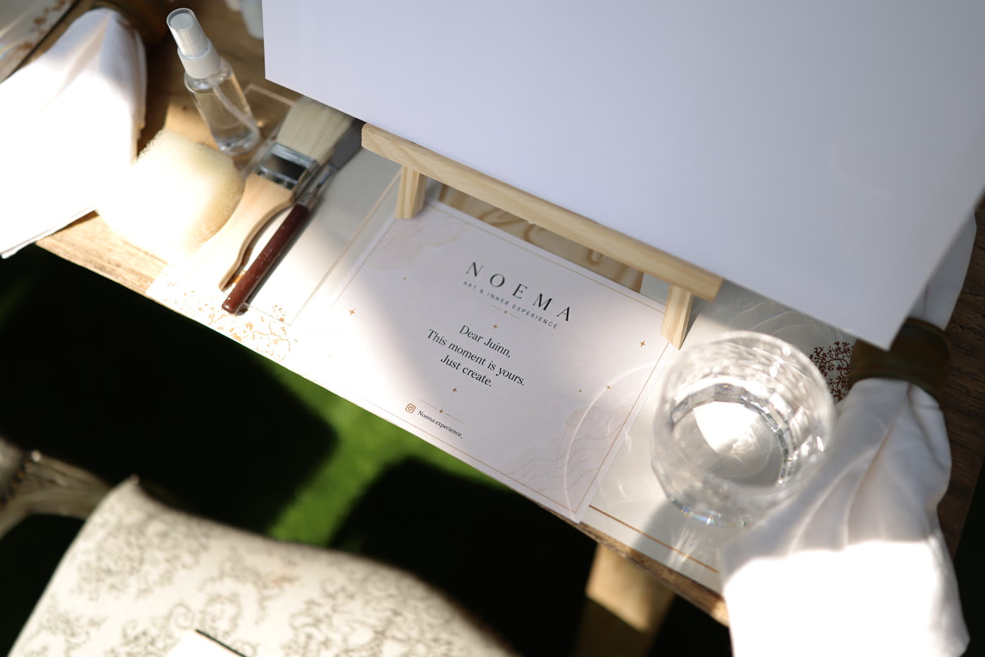 A handwritten place card at each setting: this moment is yours, just create